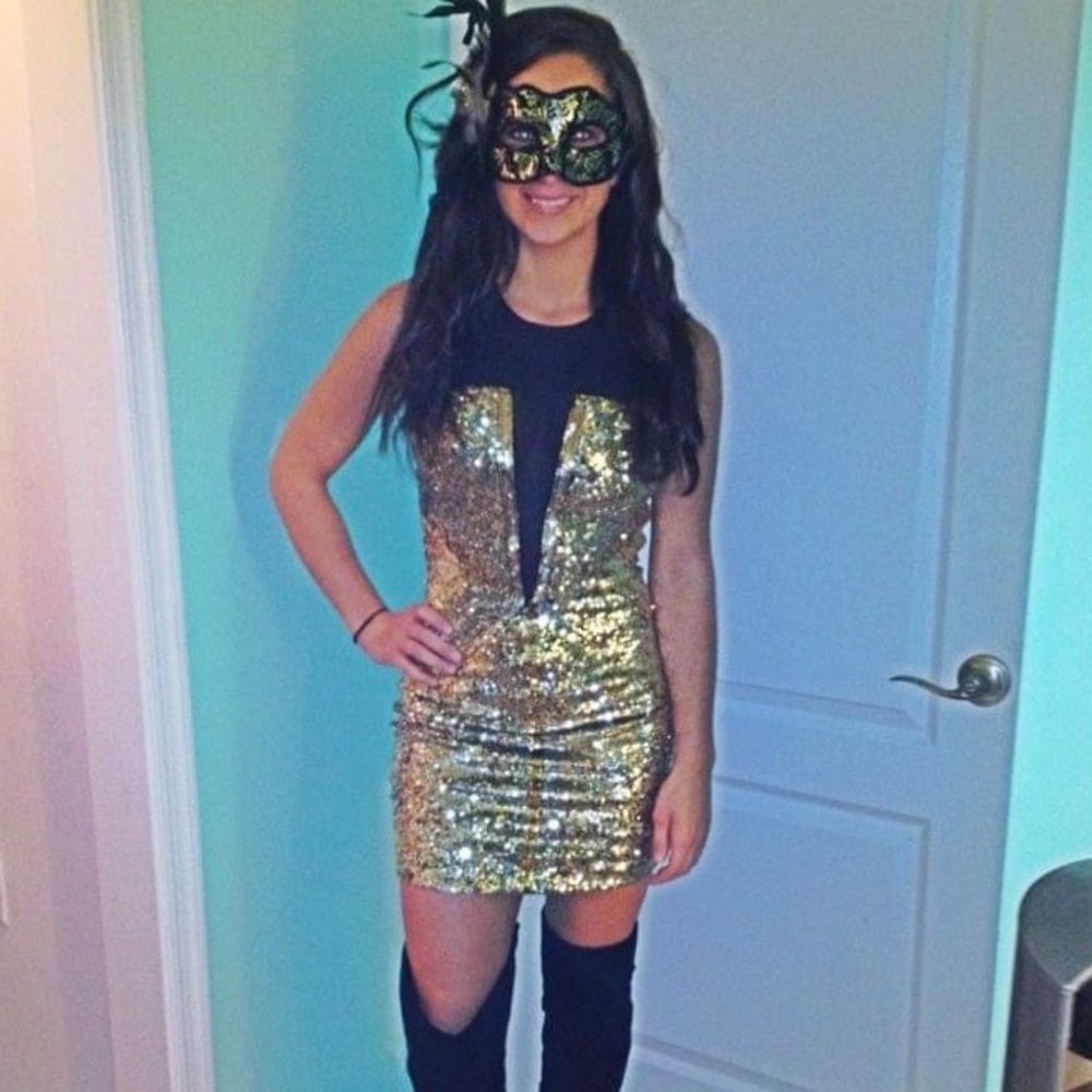 BEBE black and sparkly gold dress.
